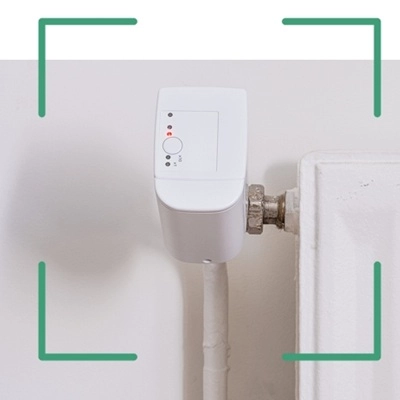  SFx de ThermoZYKLUS montée sur une vanne de chauffage pour régulation hydraulique précise
